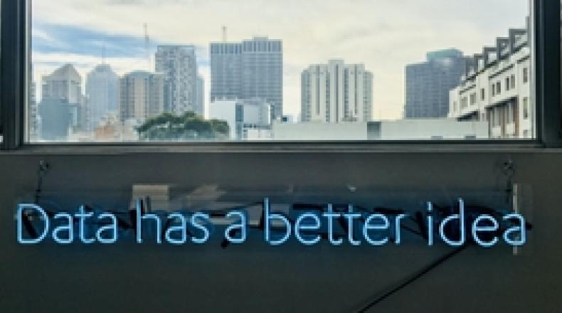 view of city from office window with words data has a better idea