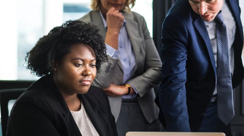 woman showing colleagues data