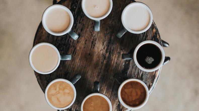 Cups of coffee varying in color