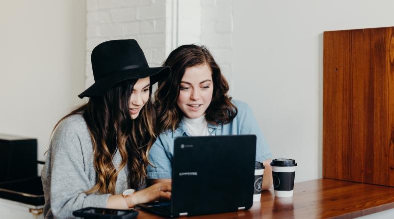 women looking at computer