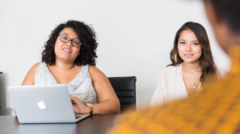 two women conducting an interview