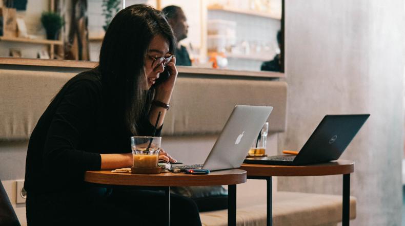 woman working in cafe