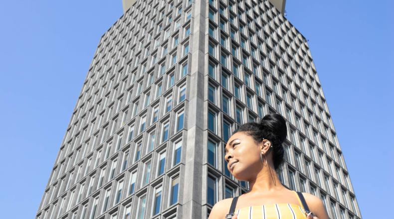 woman in front of building