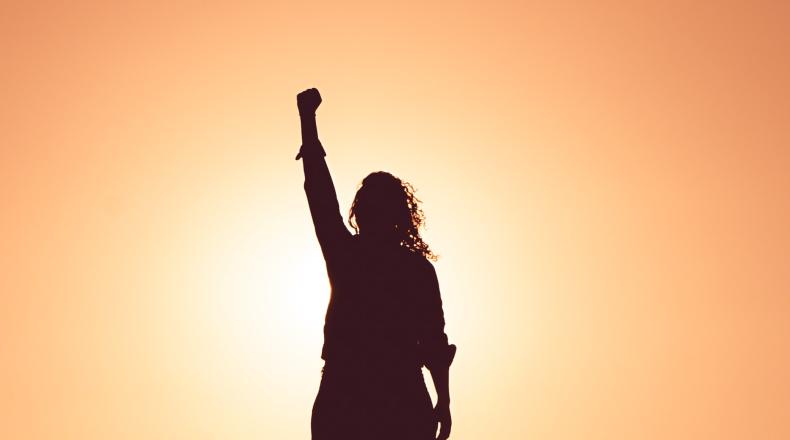 woman raising fist