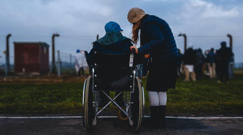 woman with man in wheelchair