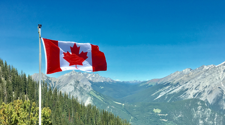 Canadian Flag in the Mountains