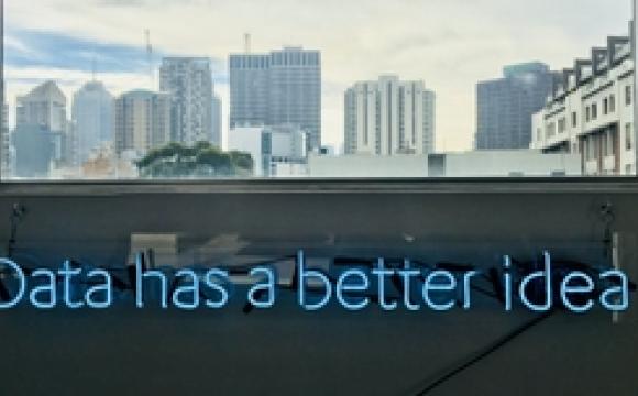 view of city from office window with words data has a better idea