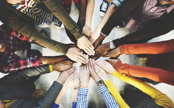 Group of diverse hands together