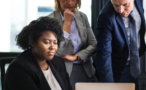 woman showing colleagues data