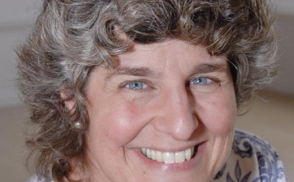 close up headshot of smiling woman