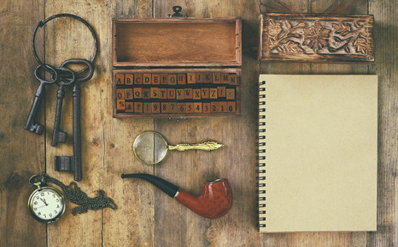 items used by a detective keys, clock, notebook