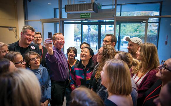 Alice Ferris and Jim Anderson taking a 360-degree selfie with Polish fundraising friends they trained during a two-day workshop for NGOs in Warsaw, Poland. The event was organized by FAOO, the Academy of Civic Organizations Foundation.