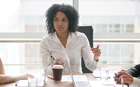 woman leading a business meeting