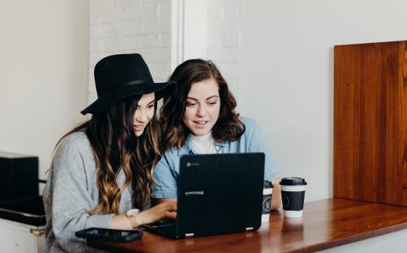 women looking at computer