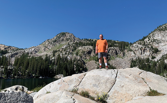 man standing on a mountain