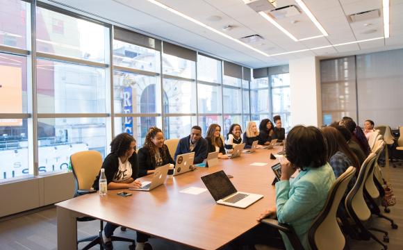 meeting of people in conference room