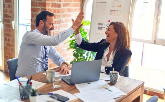 two business people high-fiving