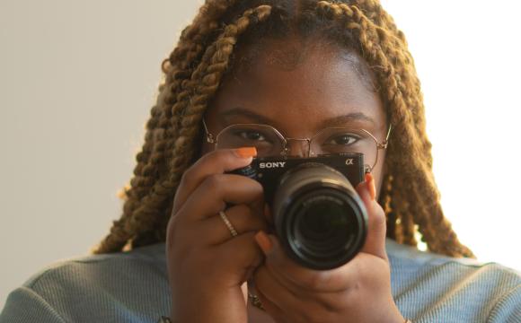 woman holding camera