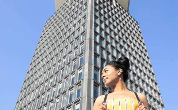 woman in front of building