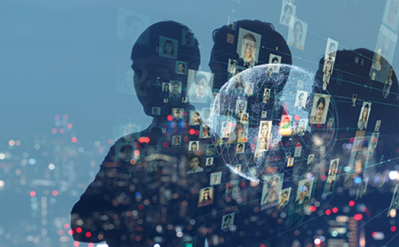 silouettes of people on a blue backgroun with a city at night overlayed