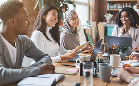 group of ethnically diverse men and women in a meeting