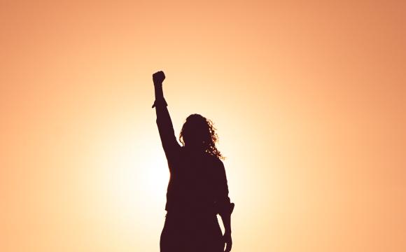 woman raising fist