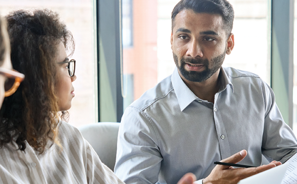 diverse people in a meeting