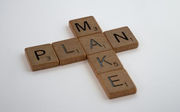 wooden letters spelling make plan